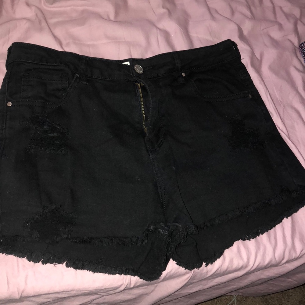 Black lightly distressed high rise shorts